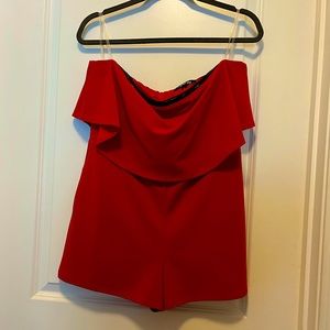 Crystal Sky strapless red shorts romper, size large w/stretch. Only worn once.